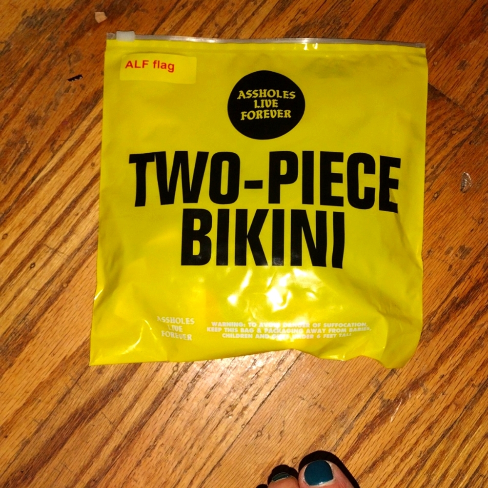 New, never worn American flag string bikini ,one size (xs) by ALF